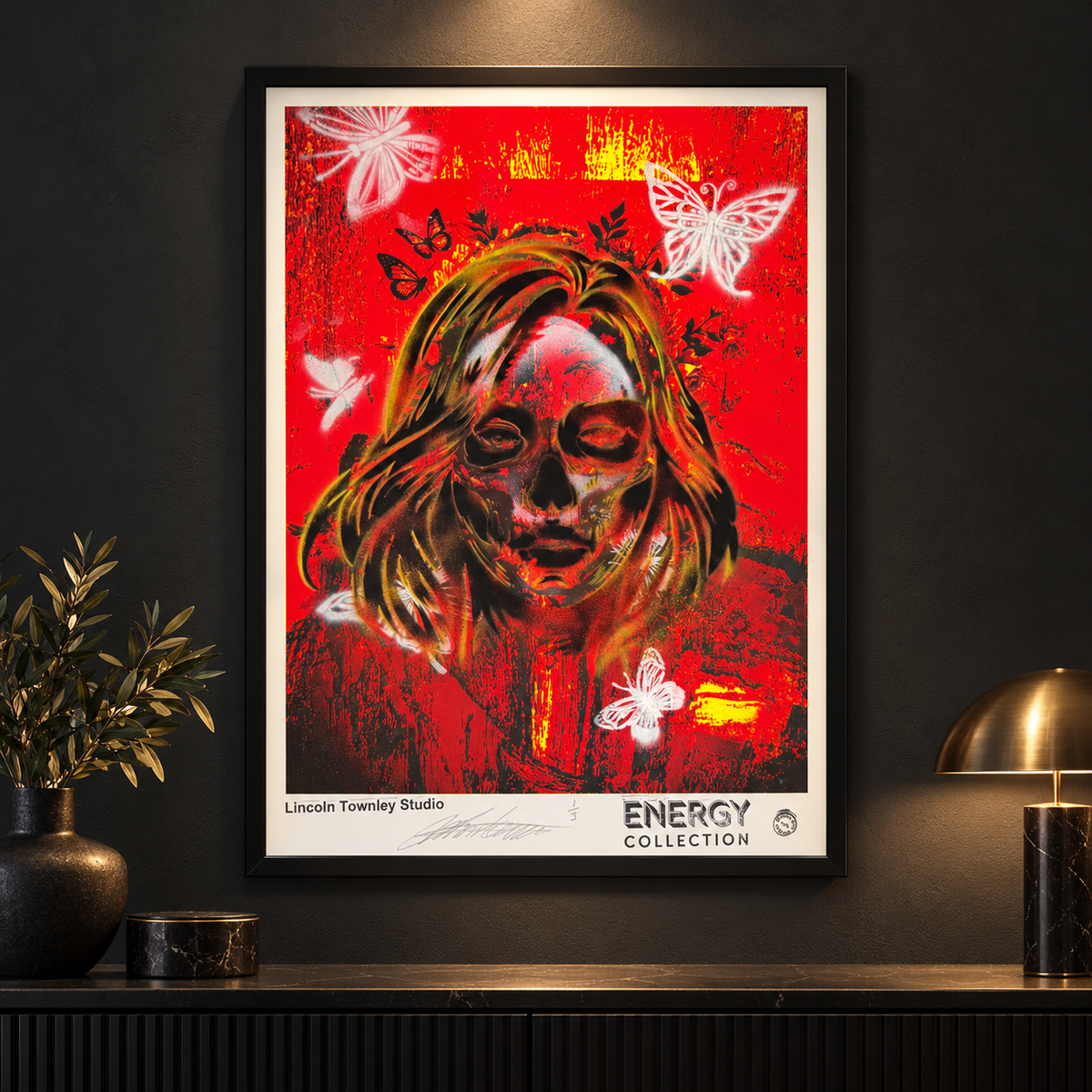 Skull Banker Print 01 — Red Butterfly displayed in a black frame on a dark gallery wall